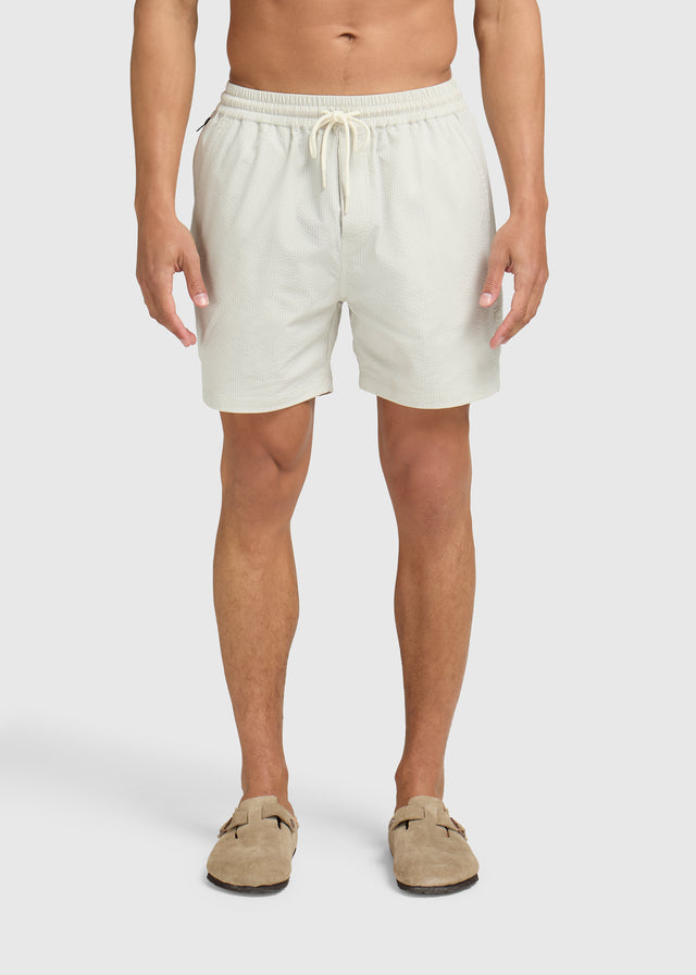 Gestreifte Seersucker-Badeshorts – Weißer Sand